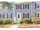 Charming home exterior featuring shutters and a well-maintained front yard at 403 Oak Harbor Ct, Marietta, GA 30066