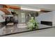 Modern kitchen featuring bar top, stainless appliances, and wooden cabinetry at 403 Oak Harbor Ct, Marietta, GA 30066