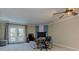 Bright living room with carpet floors, fireplace, and glass doors leading to outdoor deck at 403 Oak Harbor Ct, Marietta, GA 30066