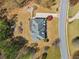 Aerial view of home with lush landscaping and long driveway at 4437 Blue Ridge Dr, Douglasville, GA 30135