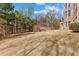 Expansive backyard featuring a pergola and well-maintained lawn at 4437 Blue Ridge Dr, Douglasville, GA 30135