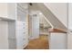 Walk-in closet with built in shelving, drawers, and a changing area with natural lighting at 4437 Blue Ridge Dr, Douglasville, GA 30135