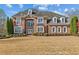 Beautiful brick home with dormer windows and manicured landscaping at 4437 Blue Ridge Dr, Douglasville, GA 30135