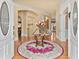 Grand foyer with hardwood floors, a decorative rug, and staircase at 4437 Blue Ridge Dr, Douglasville, GA 30135