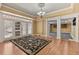 Open living area featuring elegant French doors and a view into another room with carpet at 4437 Blue Ridge Dr, Douglasville, GA 30135