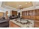 Living room featuring hardwood floors, custom built-in bookshelves, and ornate furnishings at 4437 Blue Ridge Dr, Douglasville, GA 30135