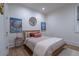 Bedroom featuring a wood-framed bed, accent pillows, and art pieces at 515 Danube Ne Rd, Atlanta, GA 30342