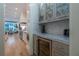 Convenient butler's pantry featuring sleek countertops, custom cabinetry, and a built-in beverage fridge at 515 Danube Ne Rd, Atlanta, GA 30342