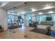Home gym features glass walls, treadmills, weights, and TV's with mirrors for enhanced workouts at 515 Danube Ne Rd, Atlanta, GA 30342