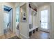 Bright entryway with built-in storage, bench, and natural light at 515 Danube Ne Rd, Atlanta, GA 30342