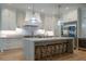 Gourmet kitchen featuring a center island, wooden stools, and stainless steel appliances at 515 Danube Ne Rd, Atlanta, GA 30342
