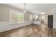 Bright kitchen with a breakfast bar, stainless steel appliances, and natural light from the large window at 2802 Oak Meadow Ln, Snellville, GA 30078