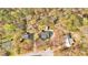Aerial view of the home's location in a neighborhood with abundant tree coverage at 4565 Canebrake Ct, Powder Springs, GA 30127