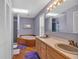 Large bathroom with double sinks, a soaking tub, and a separate shower stall at 4565 Canebrake Ct, Powder Springs, GA 30127