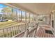 Inviting porch with rocking chairs, offering a relaxing outdoor space at 4565 Canebrake Ct, Powder Springs, GA 30127