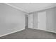Bedroom features carpet, two closets, and neutral paint at 5219 Sweet Air Ln, Stone Mountain, GA 30088
