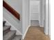 Hallway with wood floors and neutral paint color at 5219 Sweet Air Ln, Stone Mountain, GA 30088