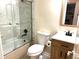 Bathroom featuring a shower-tub combination with modern fixtures and stylish vanity at 919 Dunbar Dr, Dunwoody, GA 30338
