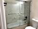 Bathroom featuring a shower-tub combination with modern fixtures and stylish vanity at 919 Dunbar Dr, Dunwoody, GA 30338