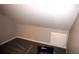 Storage attic with carpet and access panel at 253 Woodland Way, Canton, GA 30114