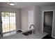 Featuring a new kitchen with granite countertops, a stainless sink and modern appliances at 253 Woodland Way, Canton, GA 30114