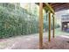 Backyard with wood posts and a hill covered in ivy creating a serene and private outdoor space at 2766 Birch Grove Se Ln # 11, Marietta, GA 30067