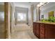 Bright bathroom with a soaking tub, double vanity, and tile flooring at 2766 Birch Grove Se Ln # 11, Marietta, GA 30067