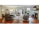 Bright and spacious living room featuring a fireplace, hardwood floors, and large windows for natural light at 2766 Birch Grove Se Ln # 11, Marietta, GA 30067