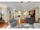 Living room with hardwood floors, an open concept to other living spaces, and natural light at 2766 Birch Grove Se Ln # 11, Marietta, GA 30067