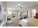Spacious main bedroom with a sitting area featuring natural light, neutral tones, and ensuite bathroom at 2766 Birch Grove Se Ln # 11, Marietta, GA 30067