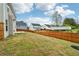 The backyard features a wood fence separating the property from neighboring homes at 4443 Quilter St, Powder Springs, GA 30127