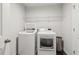 Laundry room featuring a washer and dryer at 4443 Quilter St, Powder Springs, GA 30127