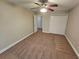 Bedroom with neutral carpeting, ceiling fan, window with blinds and closet at 100 Iverson Pl, Temple, GA 30179