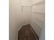 Walk-in closet with carpet floors and multiple wire rack shelves for maximum storage at 100 Iverson Pl, Temple, GA 30179