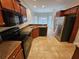 Functional kitchen with stainless steel appliances and ample cabinet space at 100 Iverson Pl, Temple, GA 30179