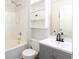 Clean bathroom featuring a shower-tub combo, updated vanity and stylish mirror at 33 Timber Ridge Dr, Cartersville, GA 30121