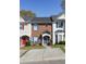 Charming townhouses with colorful doors, shutters, and well-manicured landscaping at 33 Timber Ridge Dr, Cartersville, GA 30121