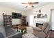 Cozy living room features a fireplace, plush seating, and hardwood floors at 33 Timber Ridge Dr, Cartersville, GA 30121