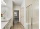 Bright bathroom with walk in shower and tiled floors at 1045 Brook Knoll Ln # 401, Cumming, GA 30041