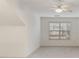 Bedroom featuring a ceiling fan, a window with blinds, and neutral carpet at 1045 Brook Knoll Ln # 401, Cumming, GA 30041