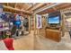 Spacious basement area featuring a TV, computer, and open wooden framework at 1933 Silvastone Dr, Decatur, GA 30033