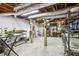 Unfinished basement area with tools and shelving at 1933 Silvastone Dr, Decatur, GA 30033