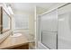Bathroom with a shower/tub combo, a single sink vanity and neutral accents at 1933 Silvastone Dr, Decatur, GA 30033
