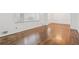 Sunlit dining room with hardwood floors and classic white trim at 1933 Silvastone Dr, Decatur, GA 30033
