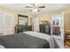 A spacious primary bedroom with an ensuite bathroom and ample storage in dressers and closets at 1933 Silvastone Dr, Decatur, GA 30033