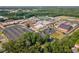 Expansive aerial view of the local high school, complete with athletic fields, and ample parking at 3545 Silver Vista Ct, Cumming, GA 30041