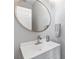 Bathroom features a vanity with a modern sink, faucet and mirror at 3545 Silver Vista Ct, Cumming, GA 30041