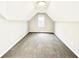 Large, empty bedroom with neutral walls and carpeting, ready for personalization at 3545 Silver Vista Ct, Cumming, GA 30041