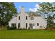 The rear exterior of home offers a large backyard, perfect for outdoor activities and relaxing at 3545 Silver Vista Ct, Cumming, GA 30041