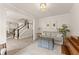 Bright living area with hardwood floors, soft furnishings, and an open layout at 6635 Canyon Cv, Cumming, GA 30028